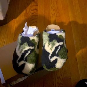 VESA faux fur upper slides, green, black, and off white